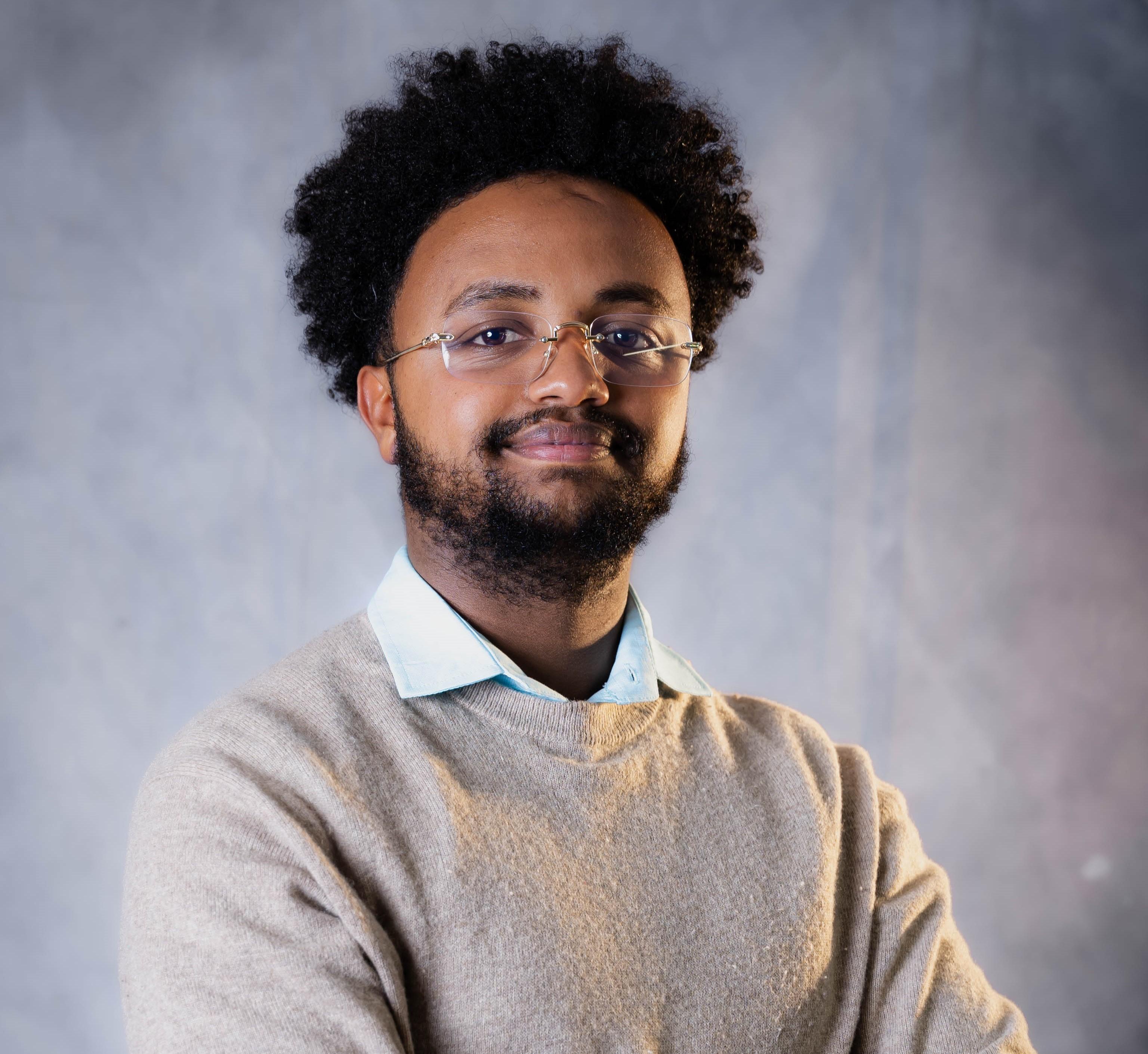 Speaking on stage at Dubai police station during a presentation